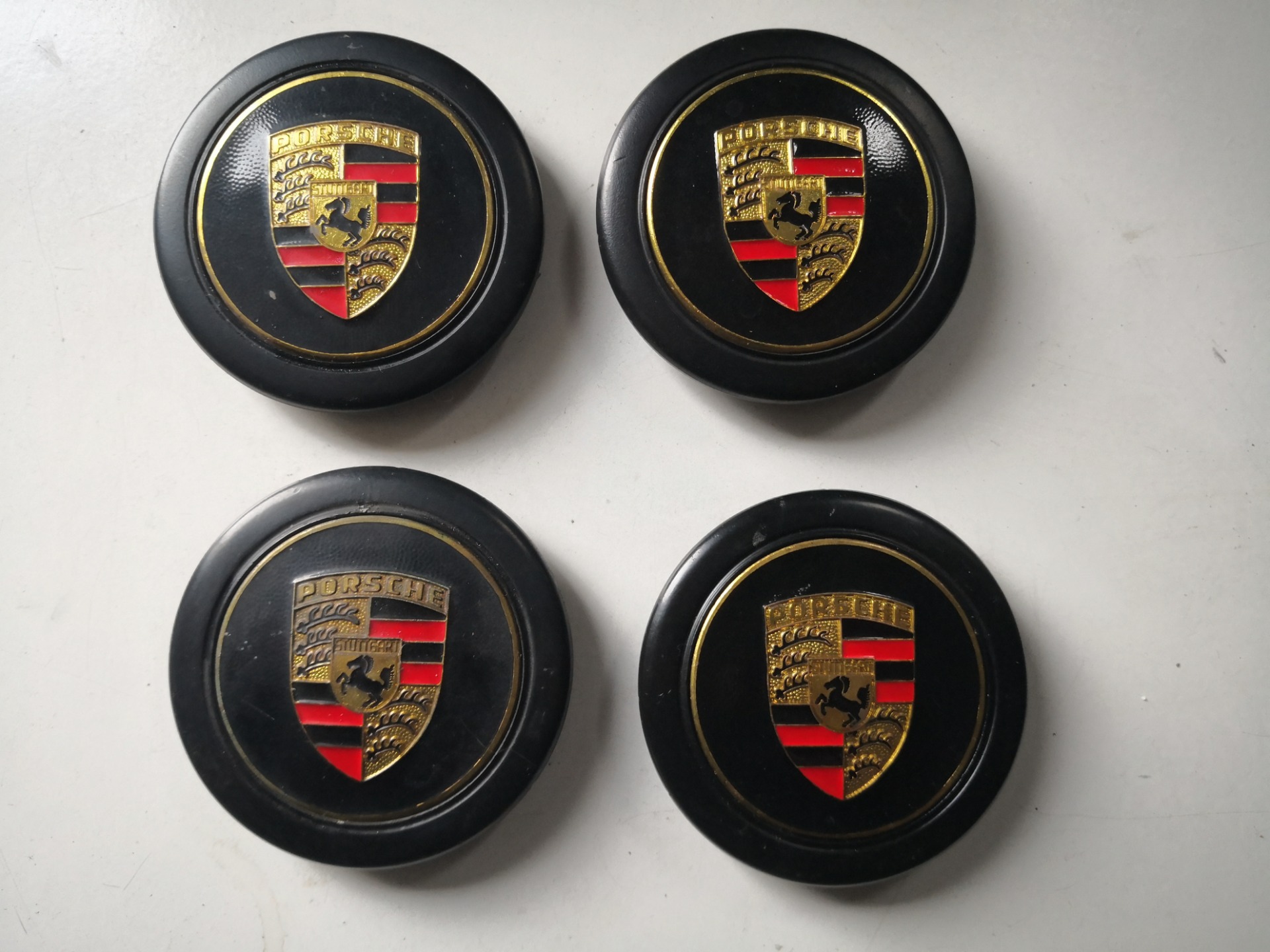 Wieldoppen set AXION-BGR zwart met gouden rand 14 inch
